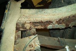 rusted frame and crossmember of the 1977 CJ7